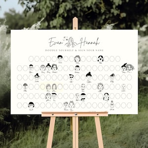 May include: A white sign on a wooden easel with the text "Evan & Hannah" and "Doodle Yourself & Sign Your Name." The sign features doodle portraits and blank circles for signatures, perfect for a wedding or event.