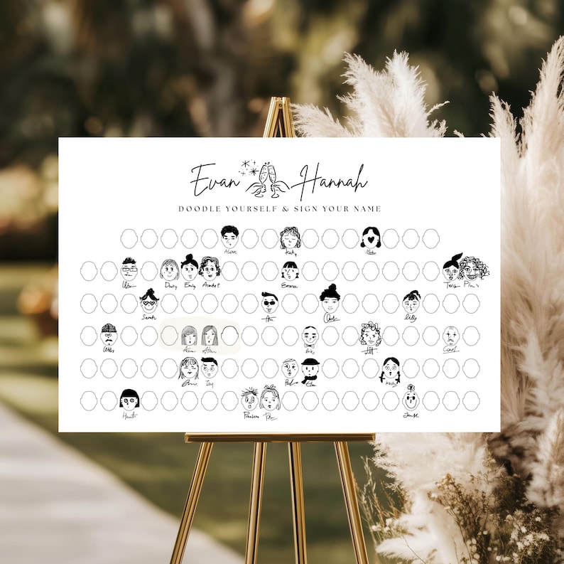 May include: A white sign on a gold easel with the names "Evan & Hannah" and the text "Doodle Yourself & Sign Your Name." The sign features a grid of blank circles with doodle portraits.