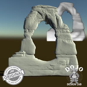 May include: A 3D printed model of a natural stone arch, a popular tourist destination. The model is gray and has a textured surface. The model is labeled "All Original" and "Dojo Design Lab".