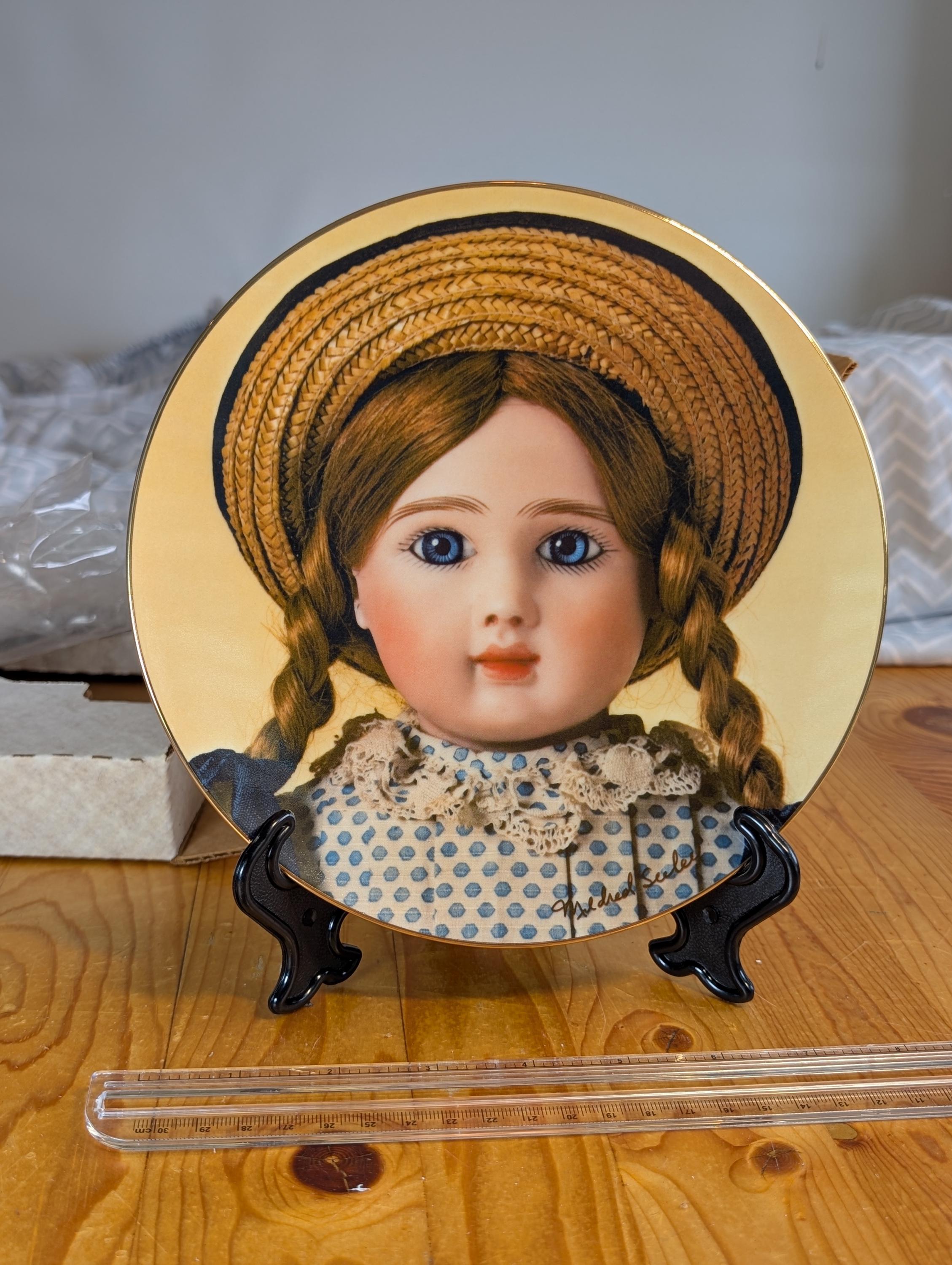 Poupée Steiner mulâtre, tête porcelaine marquée en creux A.5 et au