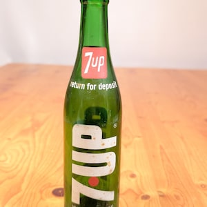 Vintage 1960S 7 UP  Green Glass Bottle No Chips Acl 10 Fluid Oz 9 And A Half Inches Tall