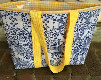 The Monet bag in inky blue toile and sunshine yellow gingham oilcloth