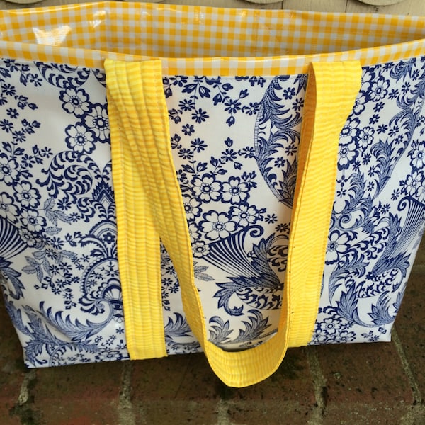 The Monet bag in inky blue toile and sunshine yellow gingham oilcloth