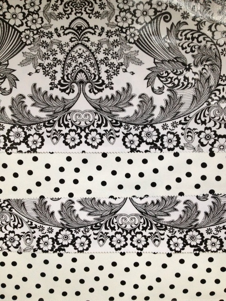 Seto of four black toile/polka dot reversible oilcloth placemats image 1