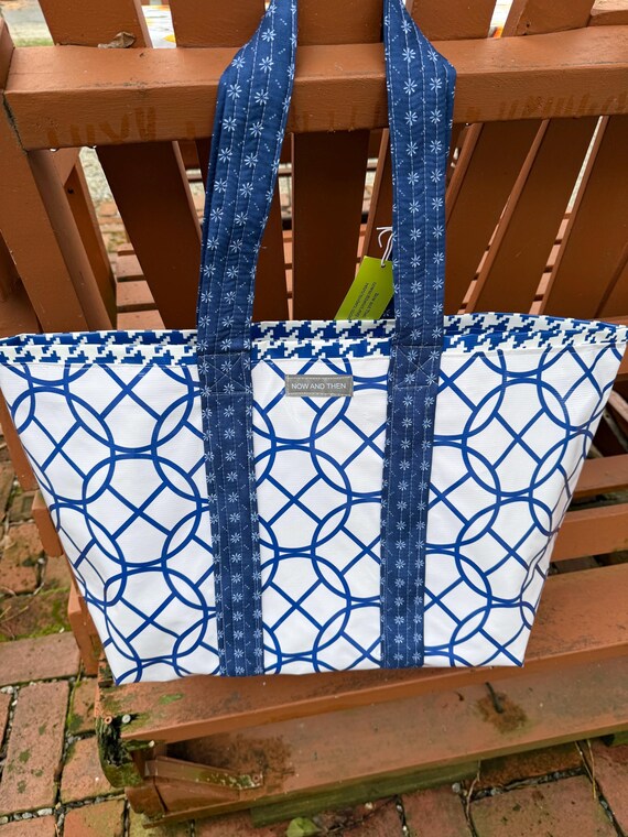 Artes gráficas: bolso grande de tela hule reversible en versión