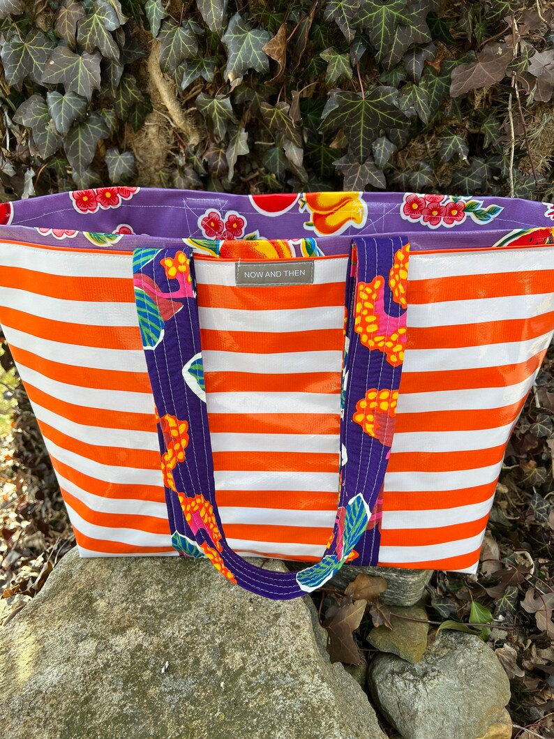 Yipes stripes funky oilcloth tote bag in orange and white image 1