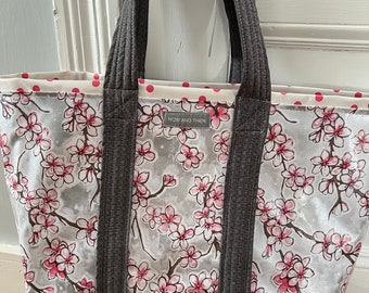 Large cherry blossom reversible  floral oilcloth tote bag on muted gray
