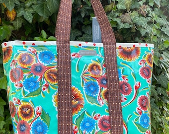 The Veracruz--large oilcloth tote bag with Mexican flowers on aqua