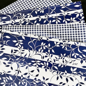 Navy blues ---Reversible oilcloth placemats in a navy vine print and gingham