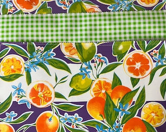 The Sanibel—-Reversible oilcloth placemats with with fruit in tropical colors