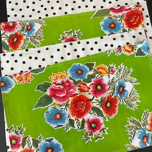 Set of four Senorita and black polka dot reversible oilcloth placemats image 1