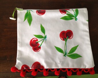 All purpose zippered pouch with cherries and ball fringe