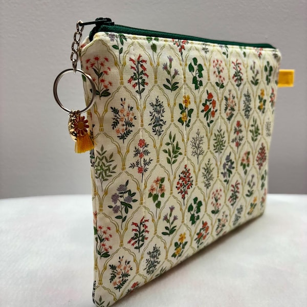 Flower make up bag with many types of flowers. Double lined inside