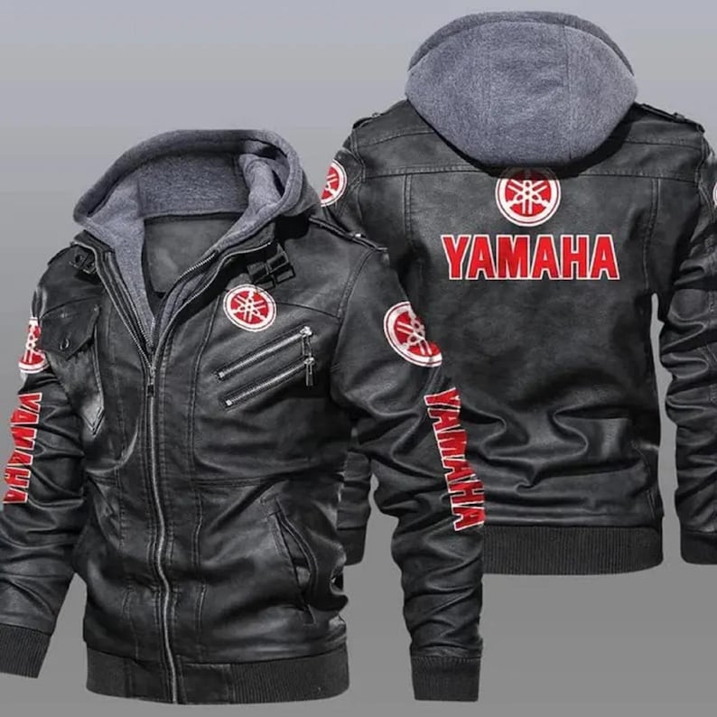 May include: Black leather jacket with a red Yamaha logo on the back and sleeves. The jacket has a zipper closure and a hood.