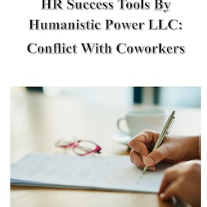 May include: A person's hand is writing on a white sheet of paper with a silver pen. A pair of pink glasses and a white coffee cup are on the table.