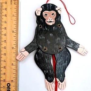 May include: A set of three ceramic mugs with a speckled, matte finish. The mugs are in shades of cream, light gray, and dark gray. Each mug has a simple, minimalist design, perfect for coffee or tea.