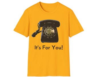May include: A yellow t-shirt with a black rotary phone graphic and the text "It's For You!"