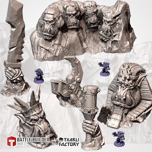 May include: A set of 3D printed miniature terrain pieces for tabletop games. The set includes a mountain with three orc heads, a giant sword, a claw, a torch, and a pharaoh-like orc head. The pieces are made of grey plastic and are designed to be used in tabletop games.