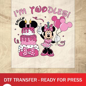 May include: A pink and white graphic featuring Minnie Mouse holding balloons and a birthday cake. Text reads "I'm Twoodles!" and "Emily". The image is a DTF transfer, ready for press.