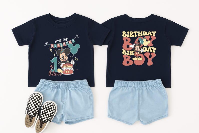 a pair of children's clothing items, including a black t-shirt with a Mickey Mouse design and a pair of shorts, along with a pair of black and white checkered shoes.