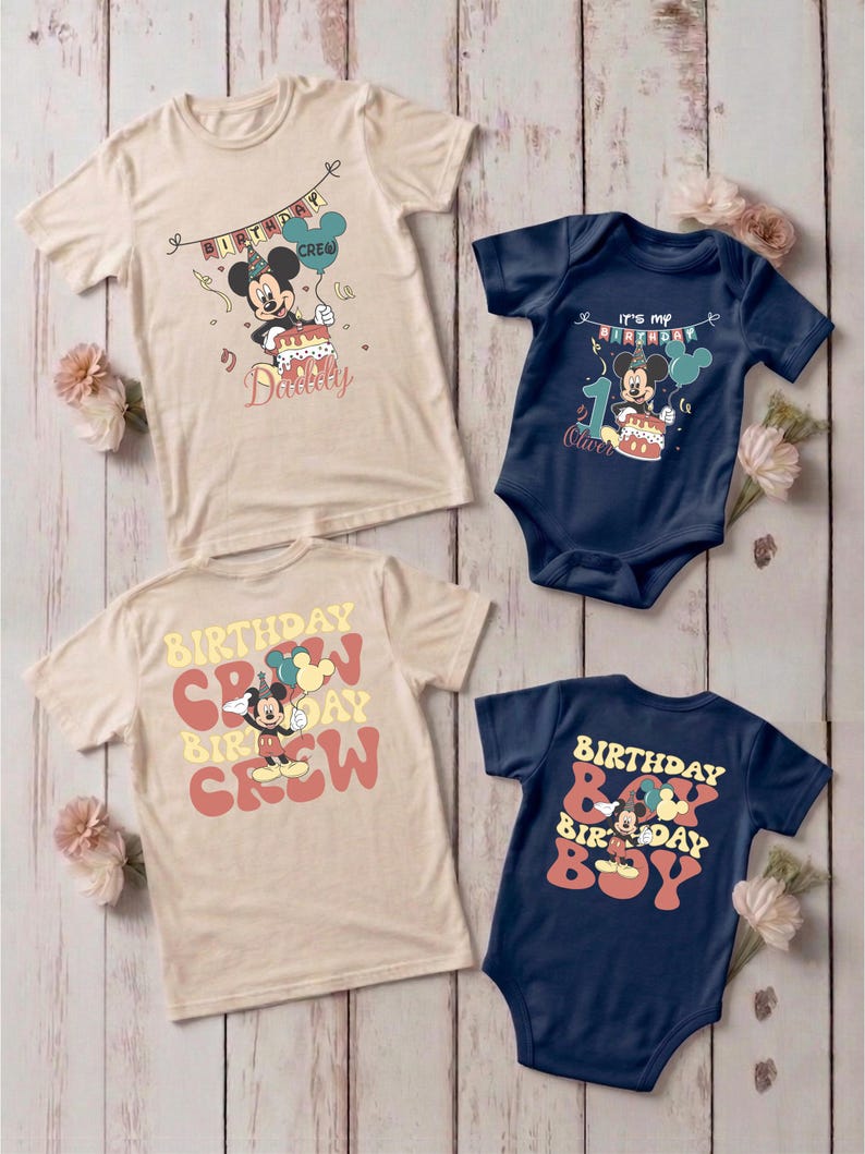 a collection of birthday-themed t-shirts and a baby onesie, all featuring the character Mickey Mouse.