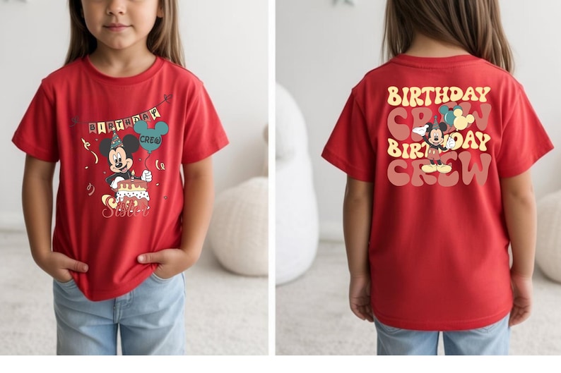 A young girl wearing a red t-shirt with a Mickey Mouse design and text on the back.
