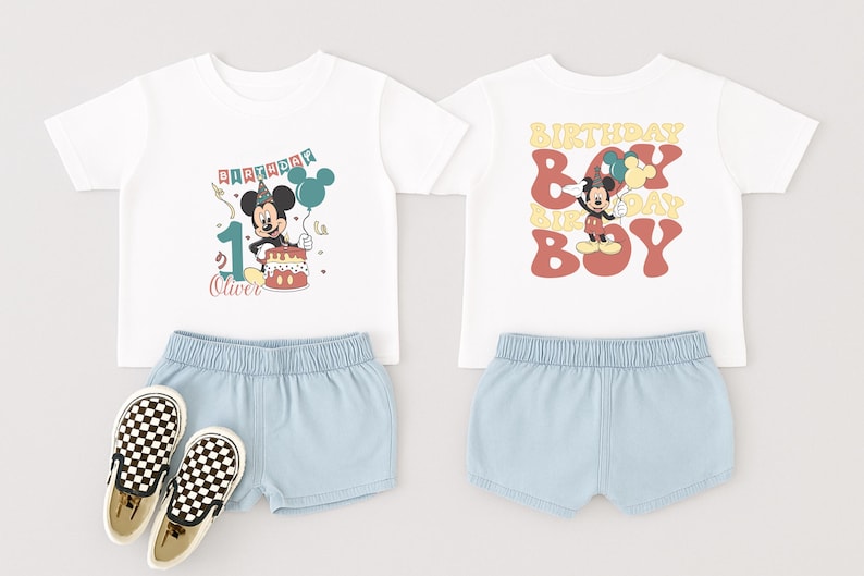 a pair of white t-shirts with Mickey Mouse designs, a pair of blue shorts, and a pair of checkered shoes.