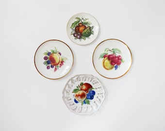 Vintage Wall Plate Collection with Fruit Theme and Gold Accents