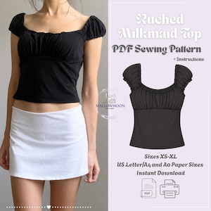 May include: A black ruched milkmaid top with short puff sleeves and a square neckline, shown as a PDF sewing pattern with instructions. The text reads Ruched Milkmaid Top, PDF Sewing Pattern, +instructions, Sizes XS-XL, US Letter/A4 and A0 Paper Sizes.