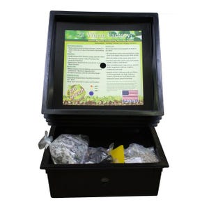 May include: A black plastic worm composting bin with three trays. The top tray has a label that reads "Worm Factory" and "Upward Migration Composting Worm Bin System". The label also includes a list of food scraps that can be composted. The bin is made in the USA.