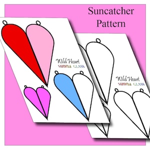 May include: A printable pattern for a suncatcher in the shape of a heart. The pattern includes four different heart shapes, two of which are colored in red, pink, blue, and white. The pattern is titled "Suncatcher Pattern" and includes the text "Wild Heart Sunna Glass".