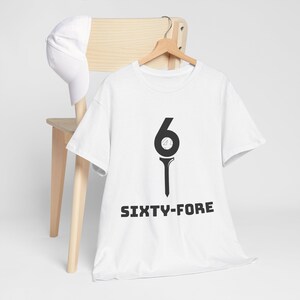 May include: White t-shirt with a black graphic of a golf tee with a golf ball in the top. The number 6 is on the golf ball. The text "SIXTY-FORE" is below the graphic.