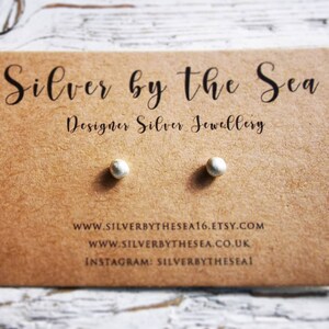 Sterling silver pebble brushed stud earrings