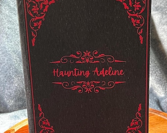 Haunting Adeline Book Rebind written by H. D. Carlton, Black and Red