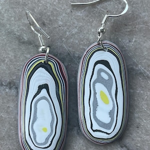 Fun upcycled,  fordite earrings.
