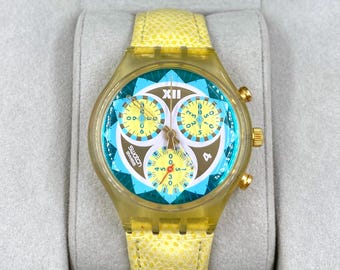 Relógio cronógrafo SWATCH vintage de 1994, cor Lemon Breeze, modelo SCK106.