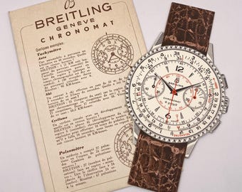 Régua de cálculo Breitling Geneve rara da década de 1950 e manual de instruções para o Chronomat 769.