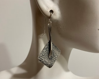 Boucles d'oreilles triangle abstrait