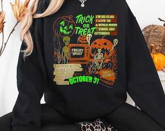 Bluza z okrągłym dekoltem na Halloween „Cukierek albo psikus” | Neonowa, upiorna grafika