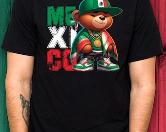May include: Black t-shirt with a graphic of a brown bear wearing a green cap and a gold necklace. The bear is dressed in Mexican-themed attire, with the text "MEXICO" in green, white, and red.