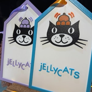 Jellycat signs Blue and Lilac close up
