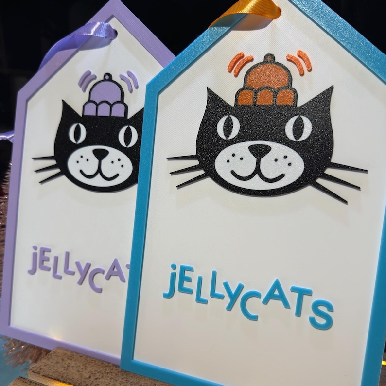 Jellycat signs Blue and Lilac close up