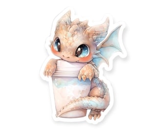 May include: A cute cartoon dragon with blue wings and big eyes is holding a white cup with a blue and white swirl design.
