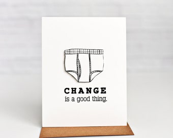 May include: A white card with a black and white illustration of underwear and the text "CHANGE is a good thing."
