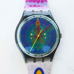 Swatch watch, good condition, good working order. new quality battery, in original box, unused.