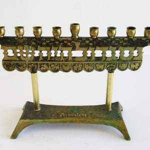 A  solid brass  vintage  hanukkah menorah, judaica made in Israel.