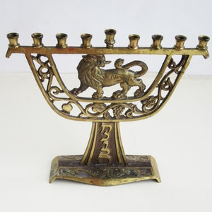 A  solid brass  vintage  hanukkah menorah, judaica made in Israel.