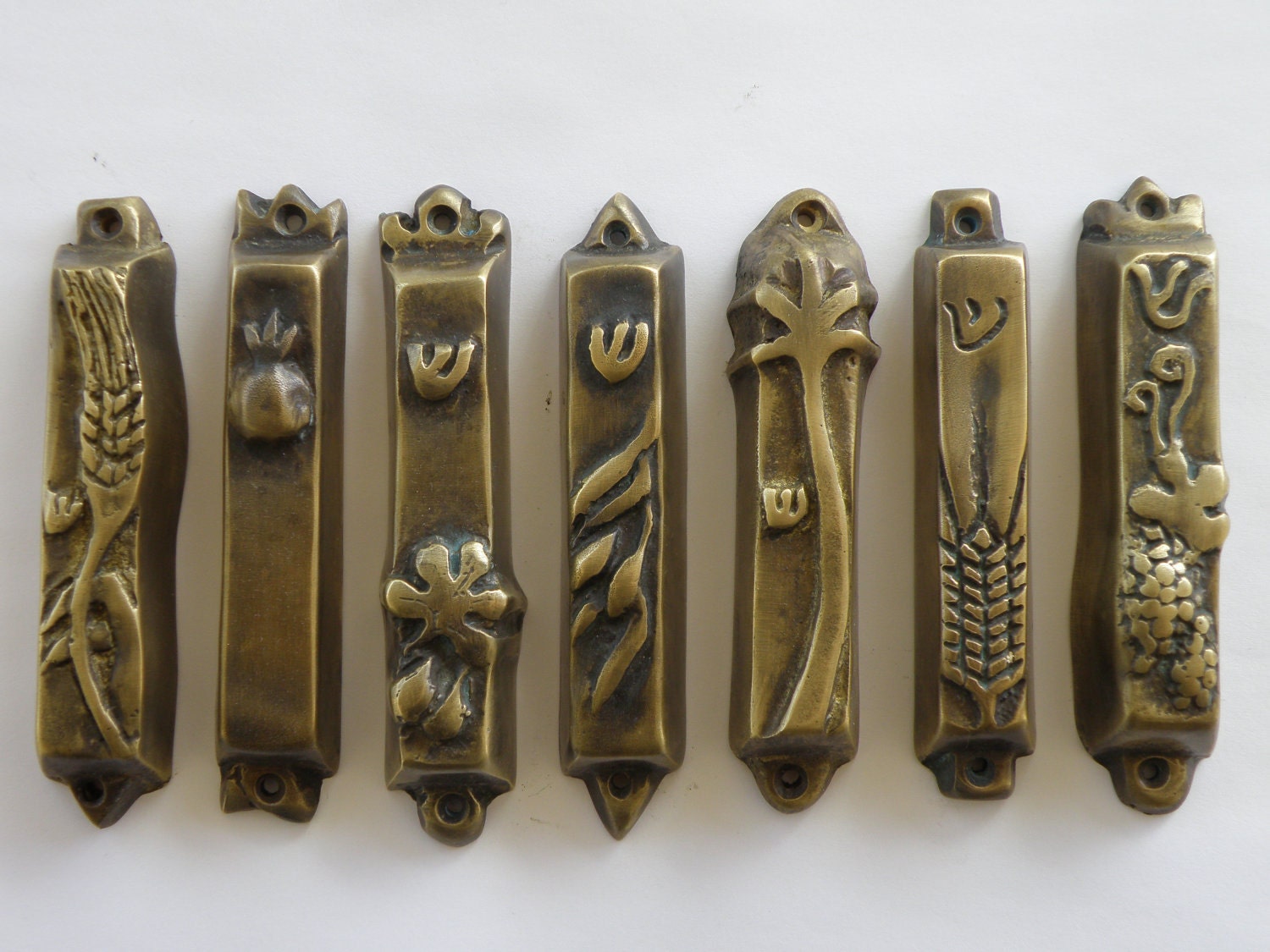 Set of 7 bronze mezuzahs from the seven species series Etsy