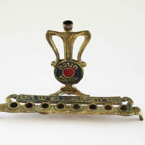 A small solid brass  vintage  hanukkah menorah,  judaica made in Israel. FREE SHIPPING!!