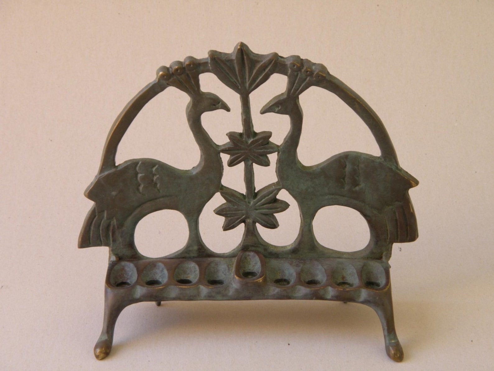 Original bronze chanukah menorah by Shaul Baz.